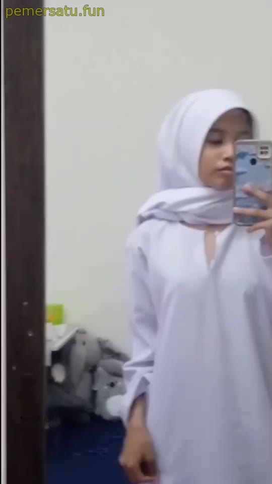 Seragam Jilbab Rekam Cermin Lepas