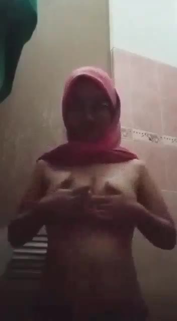 Copy-merged-1681744716559 Jilbab Pink Kacamata Menikmati Remas Toket -